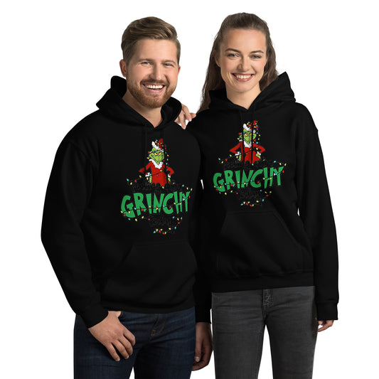 Two people wearing black hoodies with 'Grinch' design on a white background