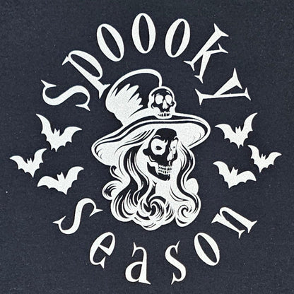 Black t-shirt with 'Spookly Season' graphic design featuring a witch and bats on a white background.