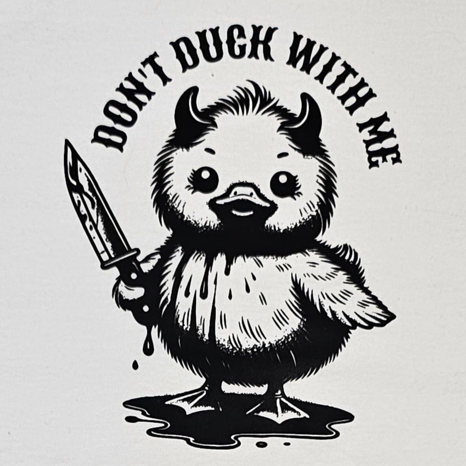 White t-shirt with a graphic of a duck holding a knife and text 'Don't Duck With Me' on a white background.