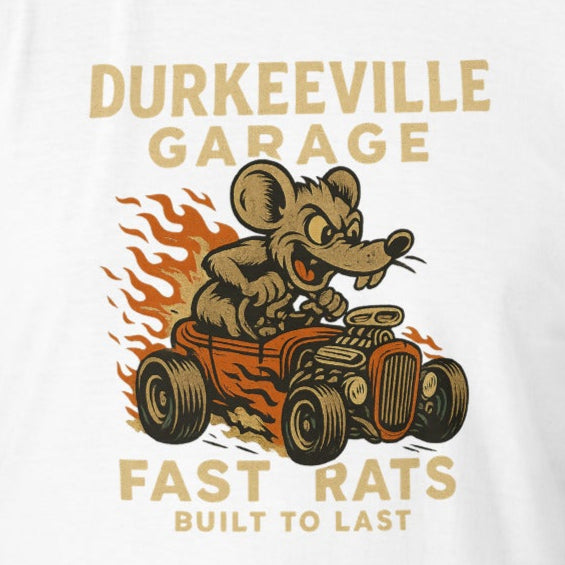 Man wearing a white graphic tee with a vintage hot rod rat car design and text that says Durkeeville Garage Fast Rats Built to Last