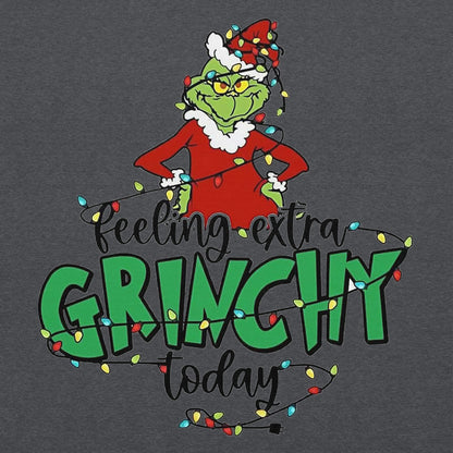 Character from a popular holiday movie with text 'Feeling extra Grinchy today' on a dark background