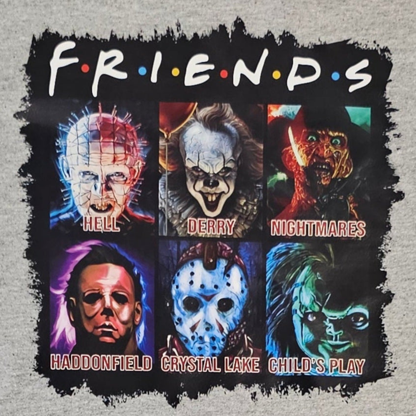 Gray t-shirt with 'Friends' graphic design featuring character faces and text.
