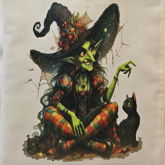 Tote bag with a fantasy design featuring a creature and flowers on a plain background