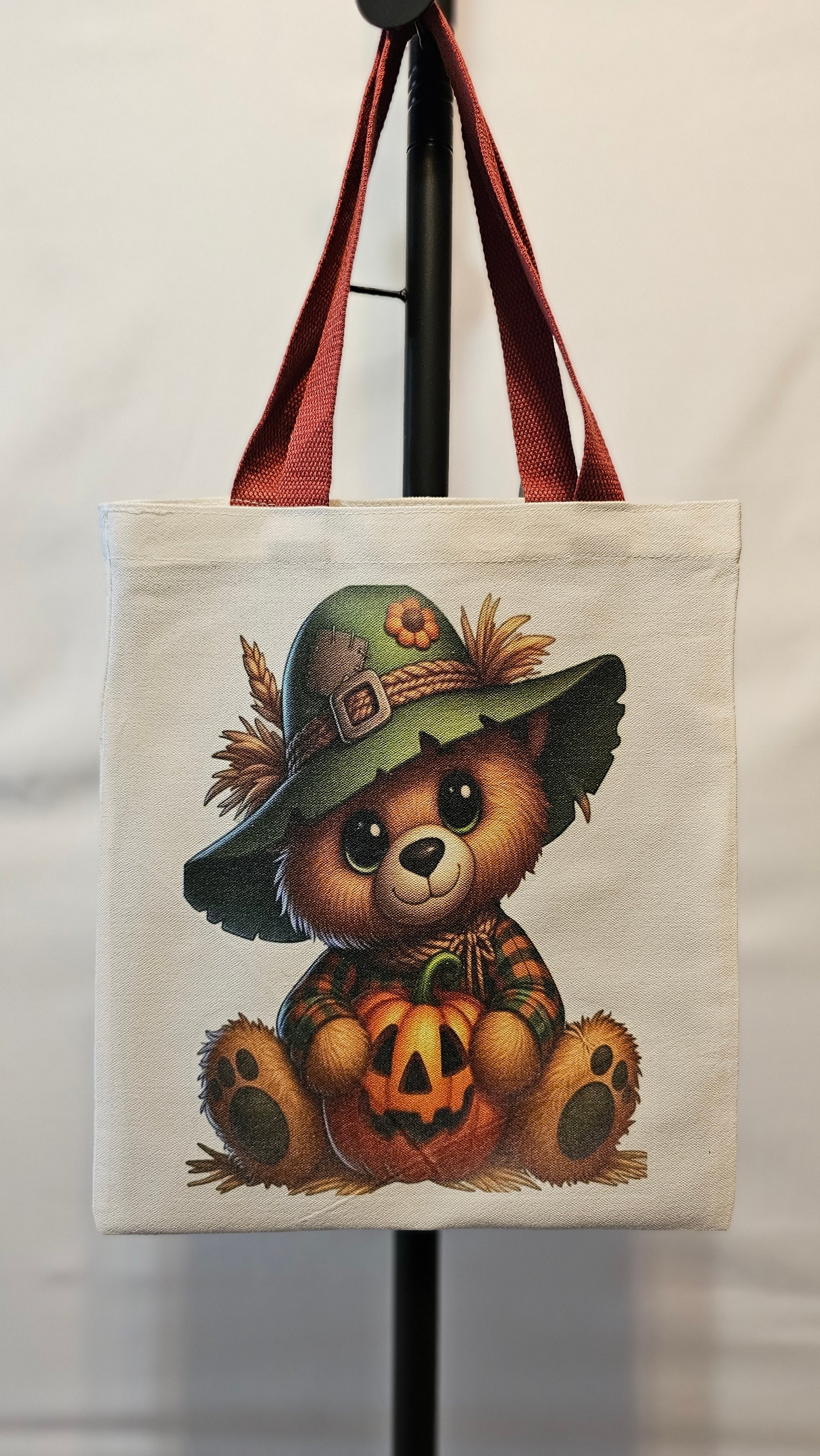Tote bag with cartoon bear design on a white background