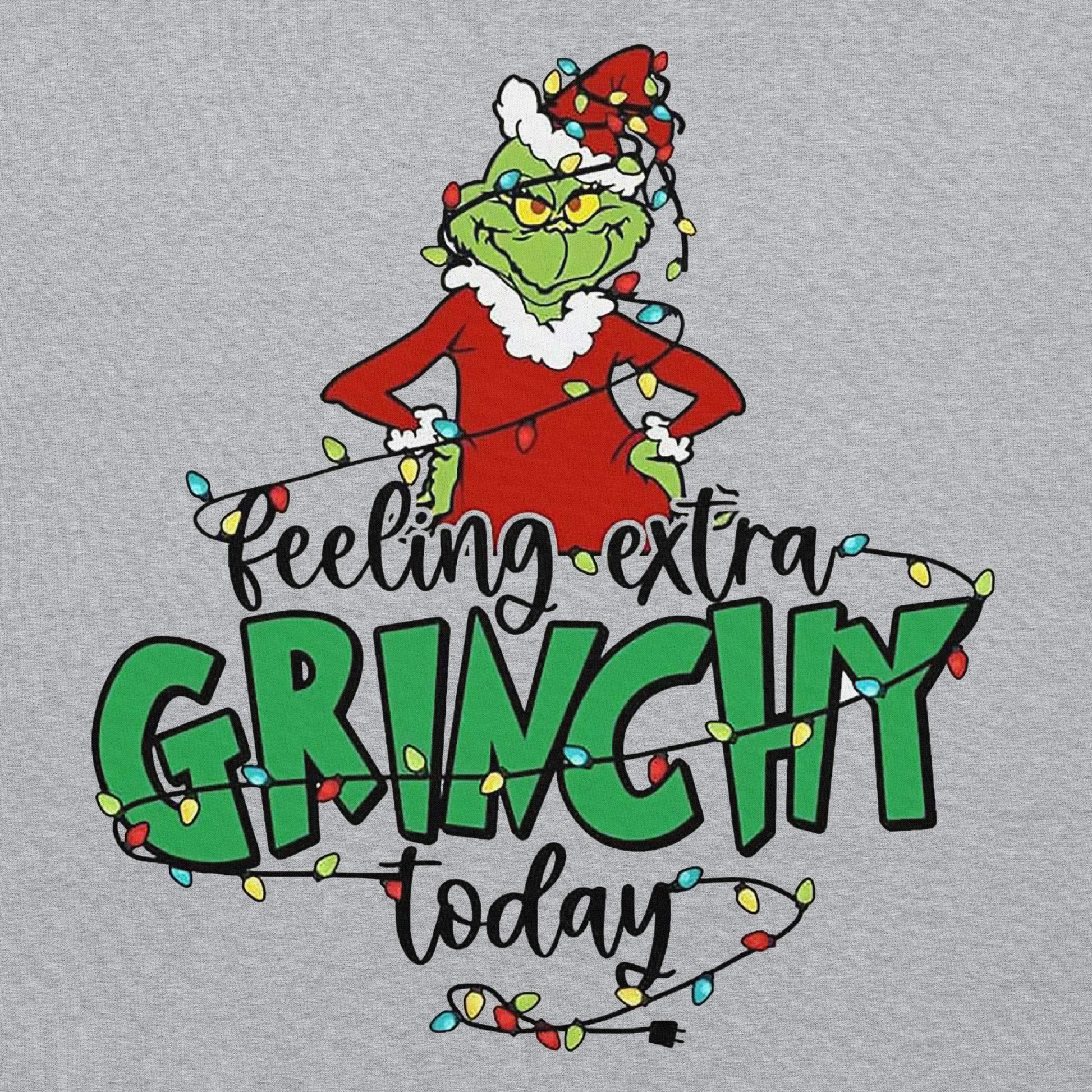 Gray sweatshirt with a Grinch graphic and 'Feeling extra Grinchy today' text.