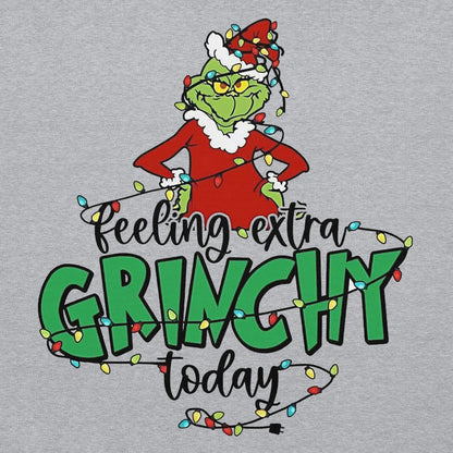 Gray sweatshirt with a Grinch graphic and 'Feeling extra Grinchy today' text.