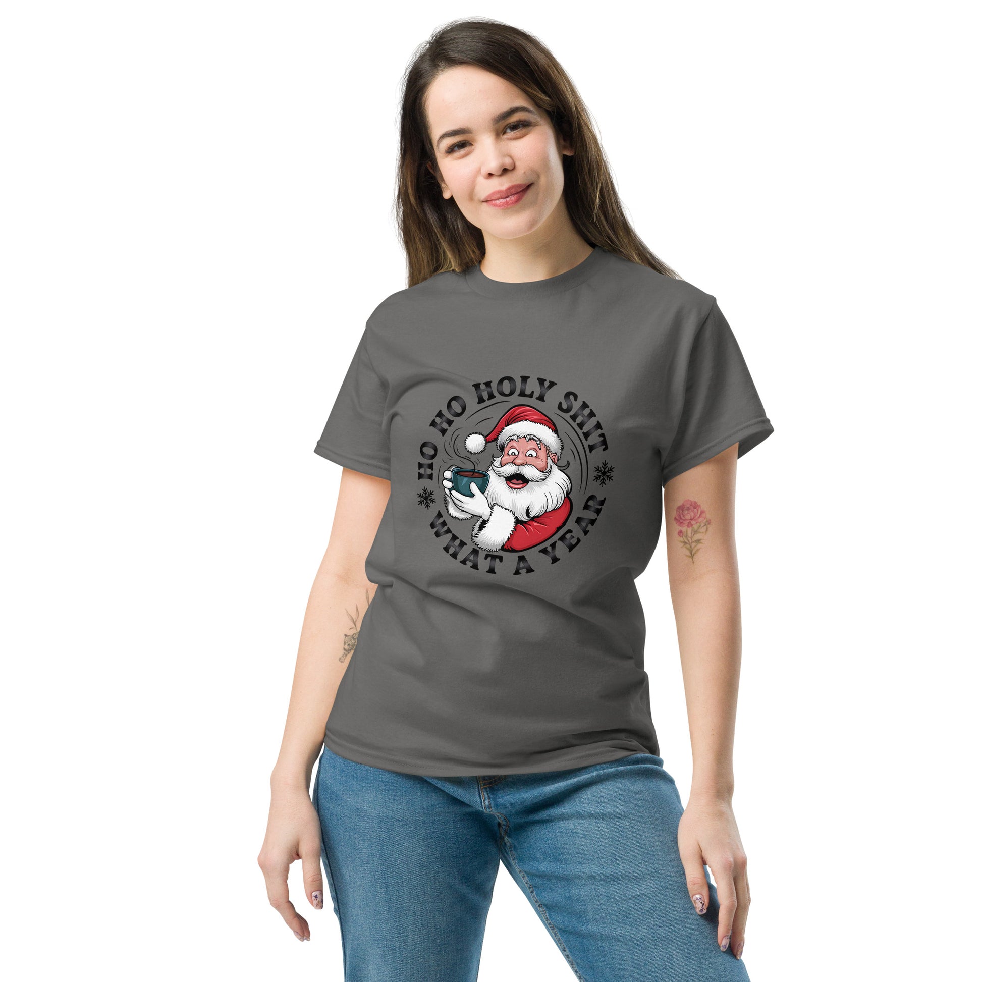 Woman wearing a gray t-shirt with a graphic design of Santa Claus and text on a white background