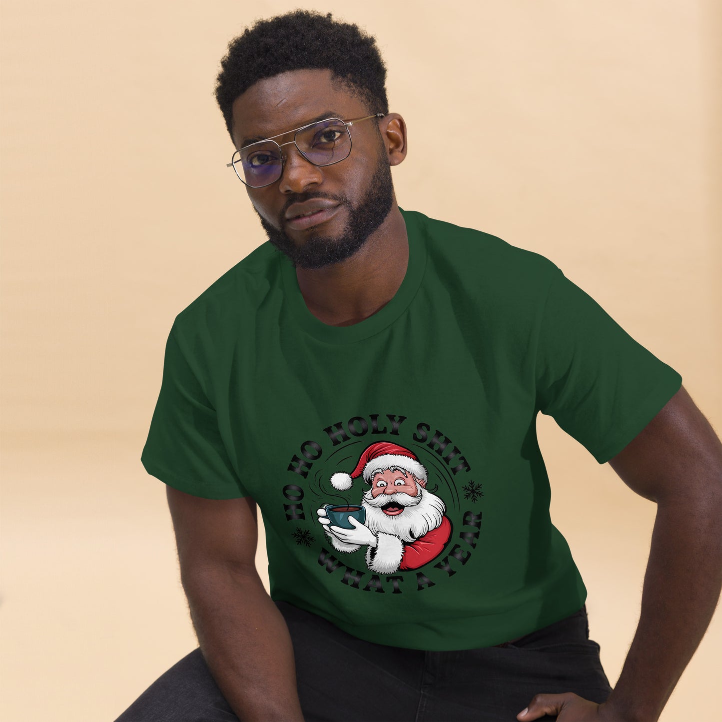Man wearing a green t-shirt with a Santa Claus graphic on a beige background