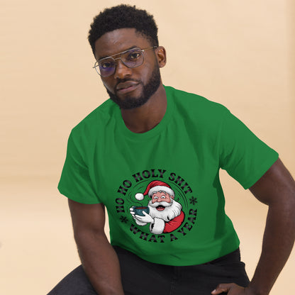Man wearing a green t-shirt with a graphic design on a beige background