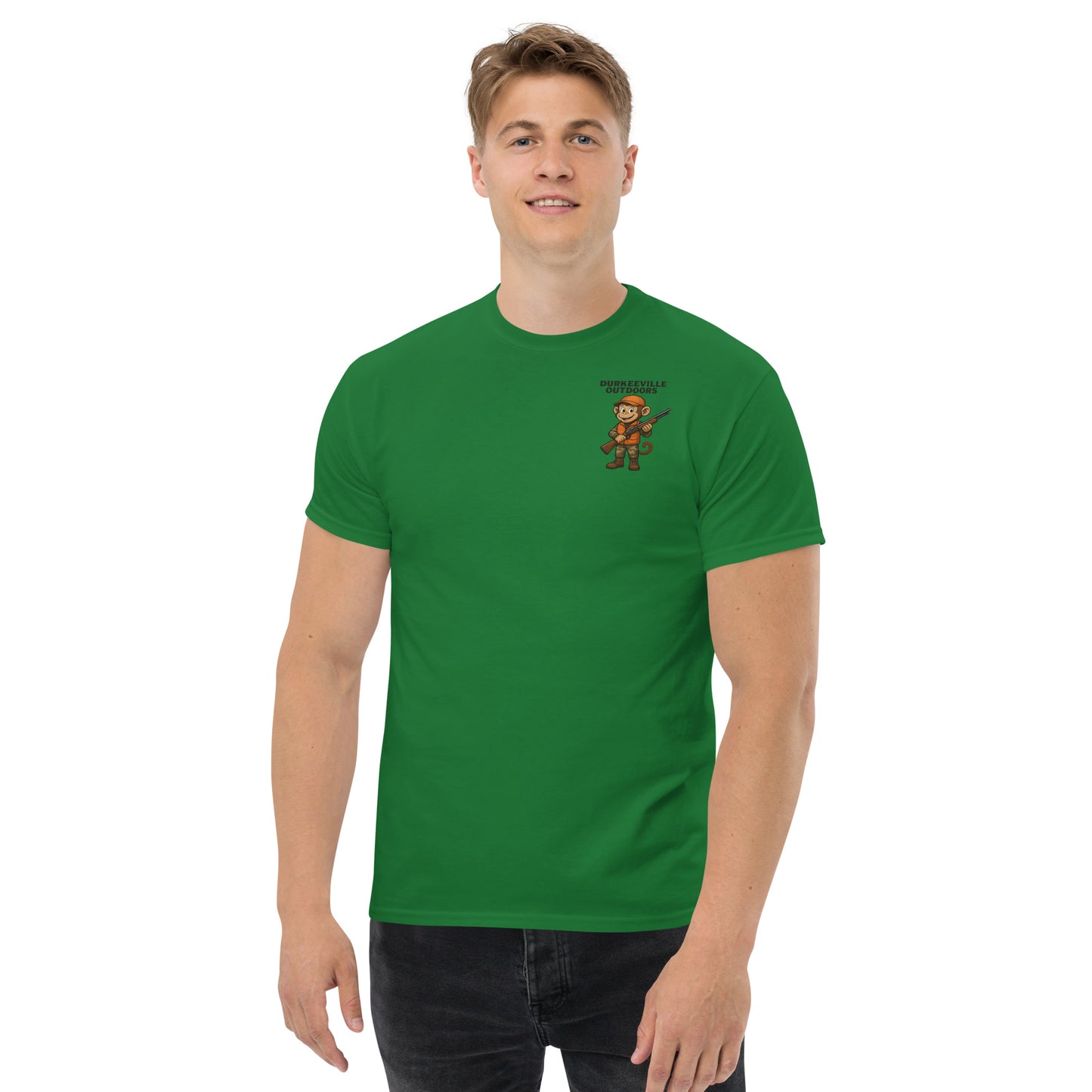 Man wearing a green t-shirt with a graphic design on a white background