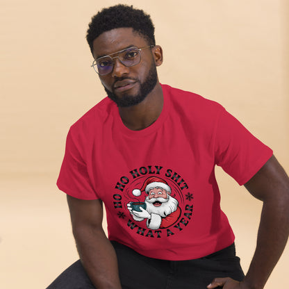 Man wearing a red t-shirt with a Santa Claus graphic and text on a beige background