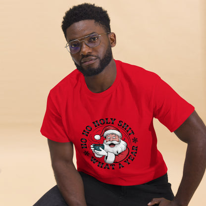 Man wearing a red t-shirt with a graphic design on a beige background