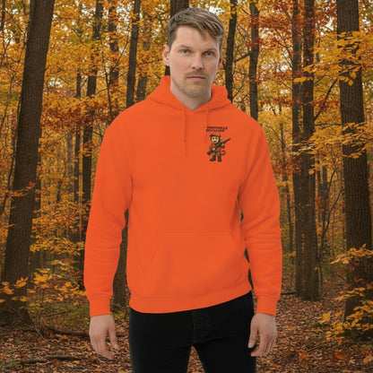 Man wearing an orange hoodie with a graphic design on a white background
