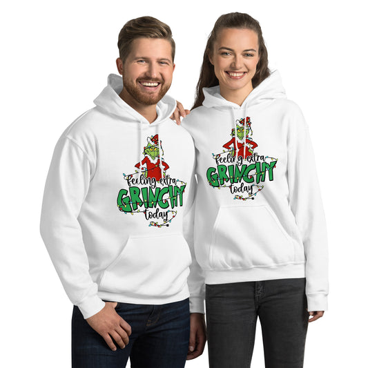 Two people wearing black hoodies with 'Grinch' design and text.
