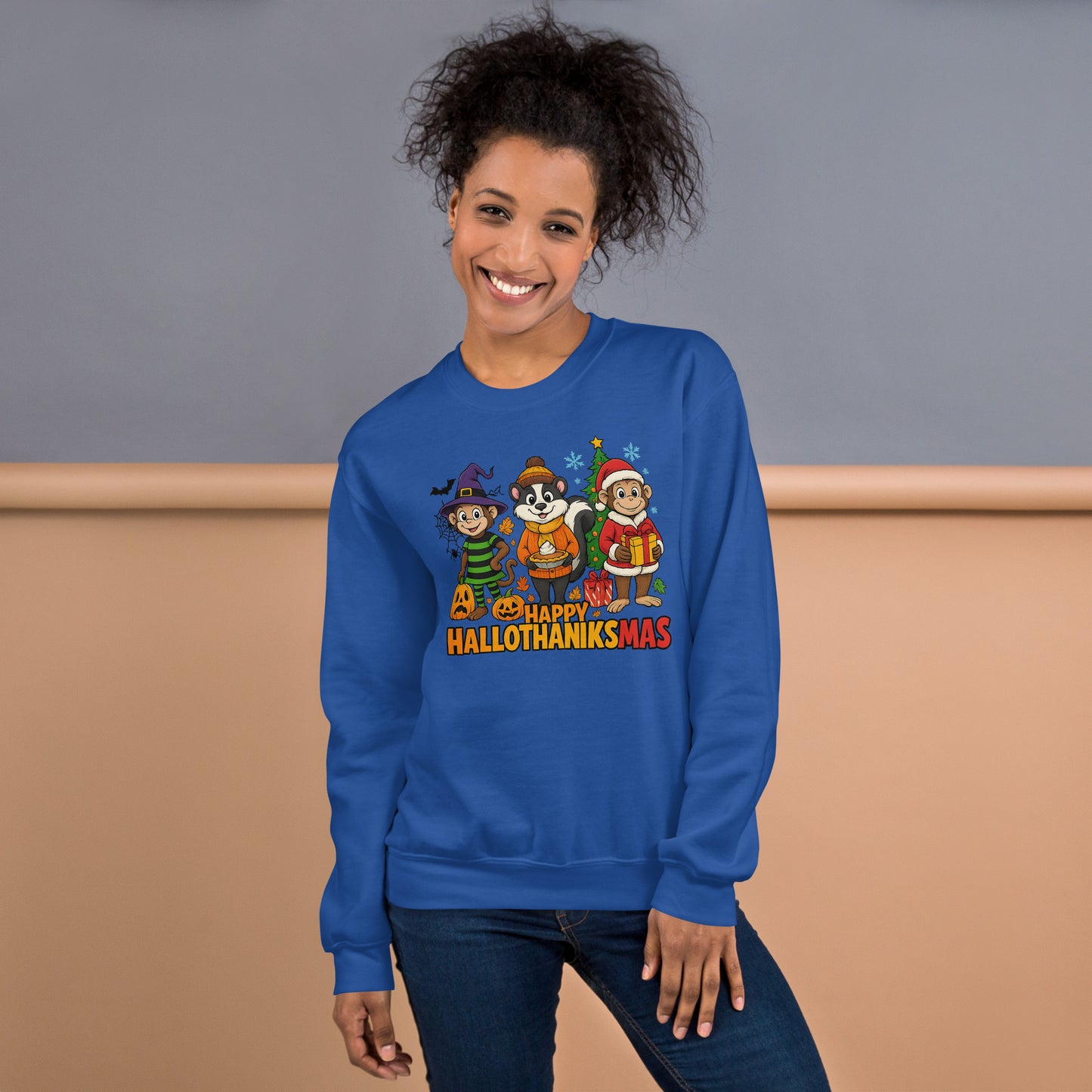 Person wearing a blue sweatshirt with 'Happy Hallothanksmas' design against a plain background