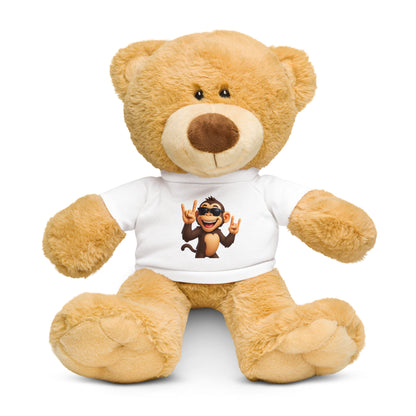 Teddy bear wearing a white t-shirt with a cartoon monkey design on a white background