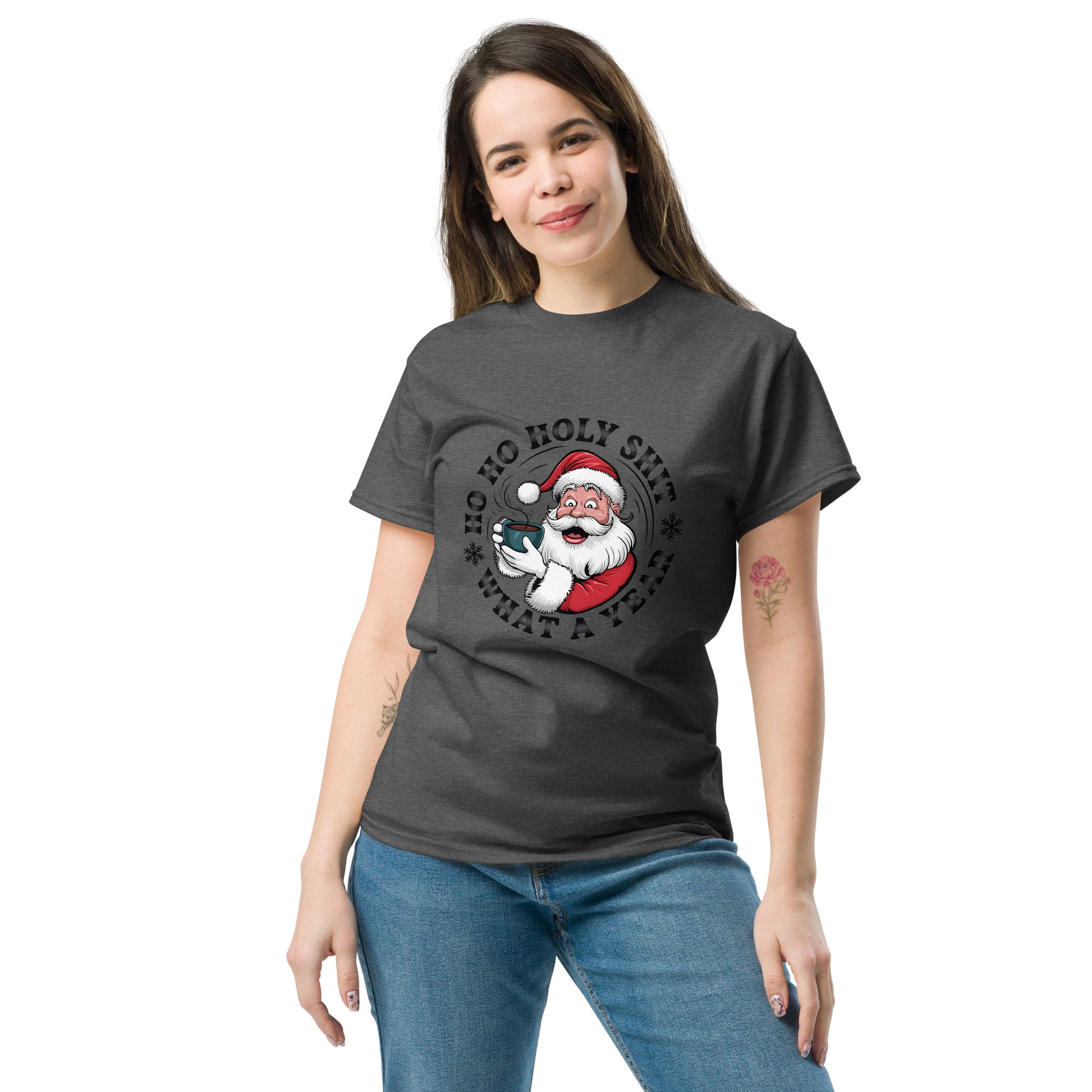 Woman wearing a dark gray t-shirt with a graphic design of Santa Claus and text on a white background