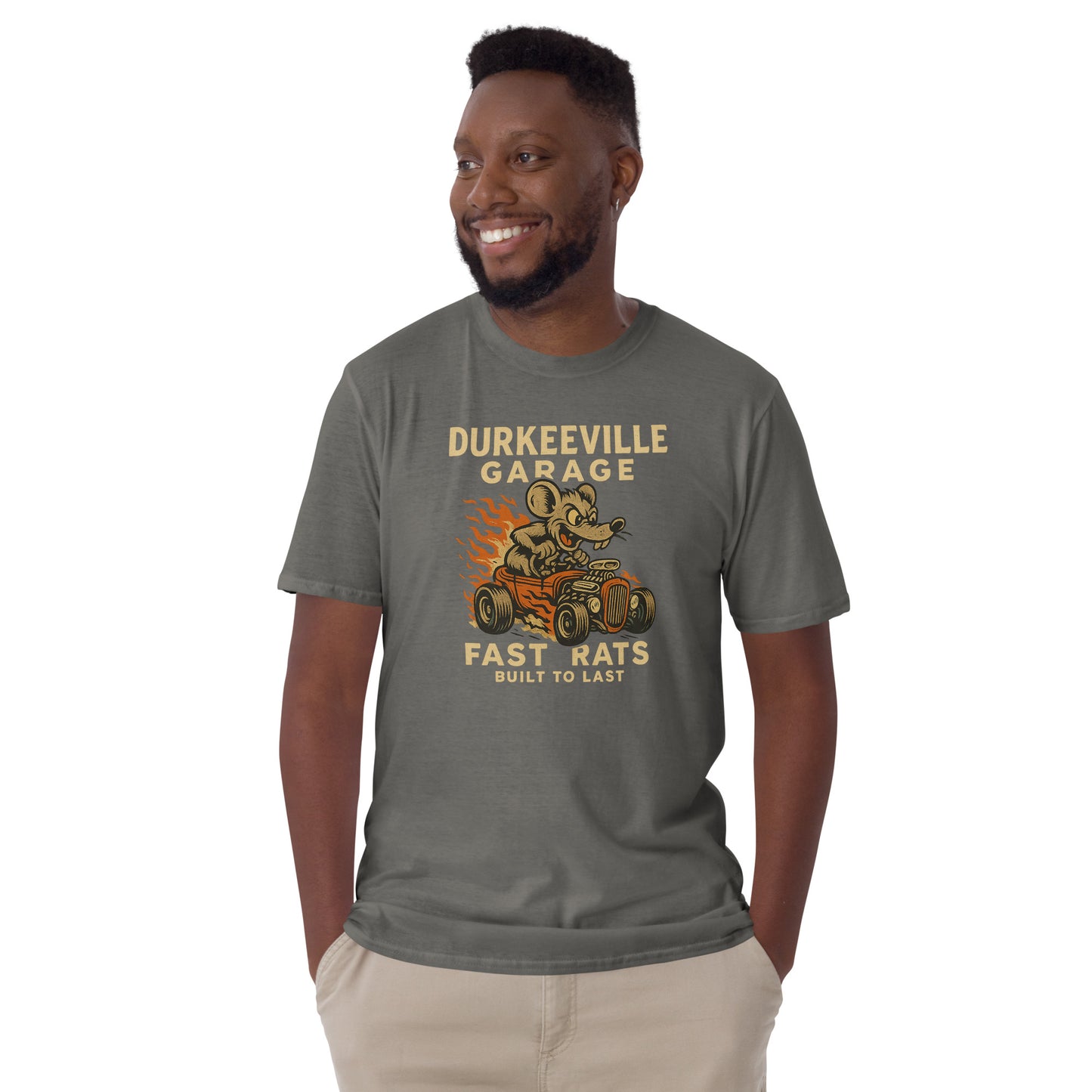 Man wearing a gray t-shirt with 'Durkeeville Garage' graphic design on a white background