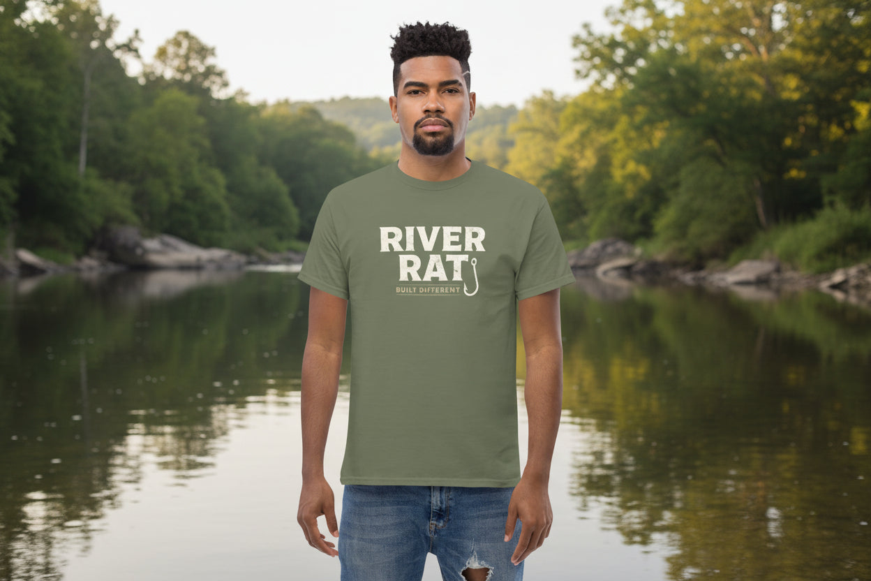 Man wearing a green t-shirt with 'River Rat' text on a white background