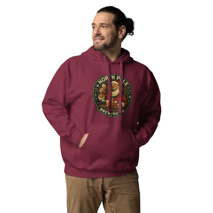 Man wearing a maroon hoodie with a 'North Pole Brewing Co.' logo on a white background