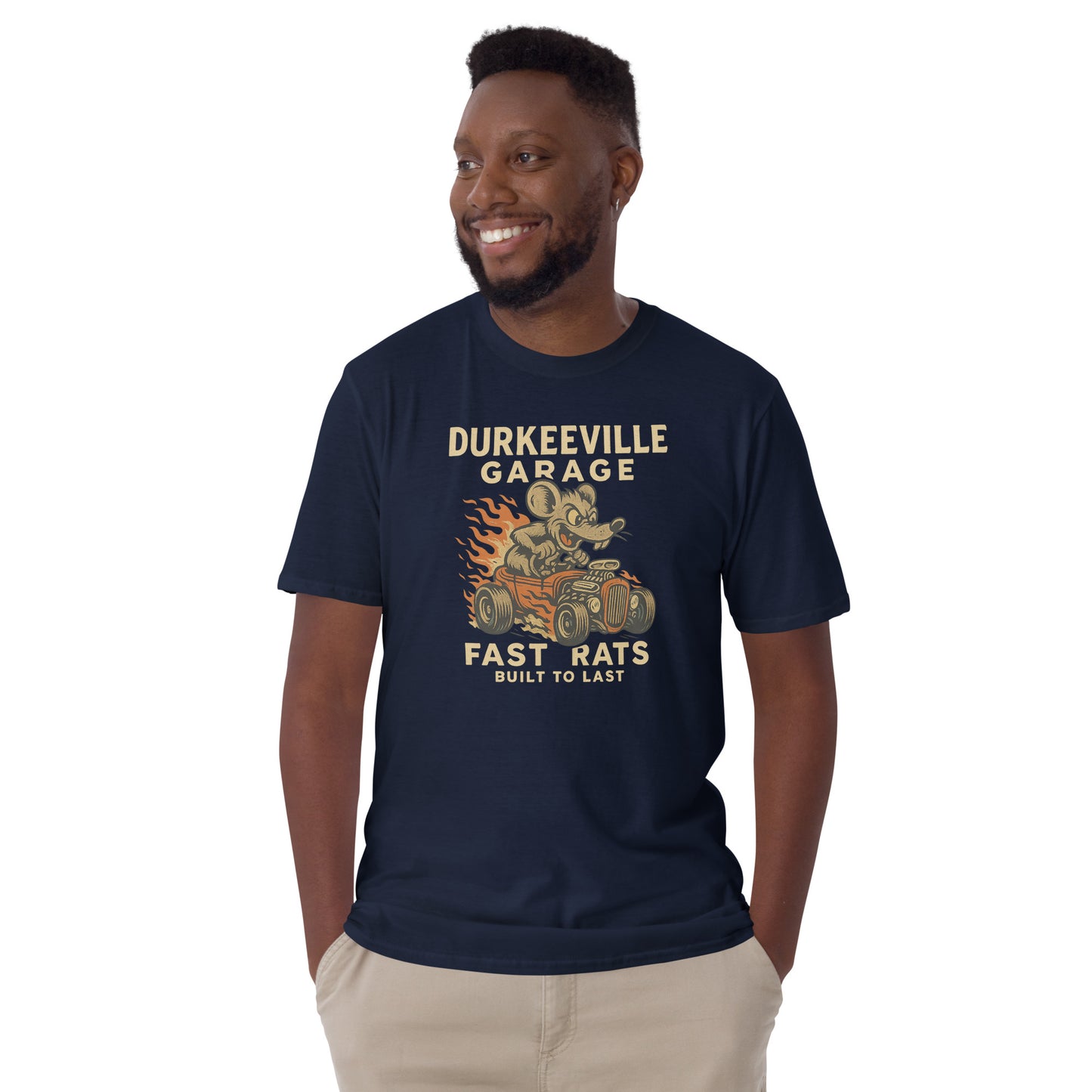 Man wearing a navy blue t-shirt with 'Durkeeville Garage' graphic design on a white background