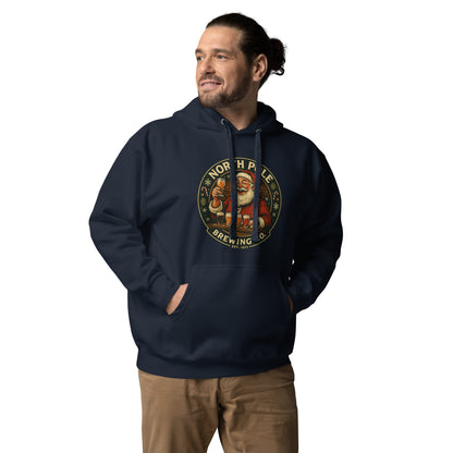 Man wearing a navy hoodie with a 'North Pole Brewing' logo on a white background