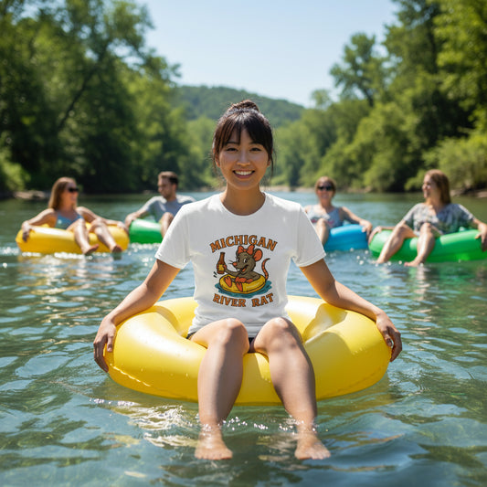 Person wearing a white t-shirt with 'Michigan River Rat' graphic design on a white background