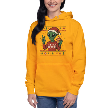 Person wearing a yellow hoodie with a Christmas-themed alien design on a white background